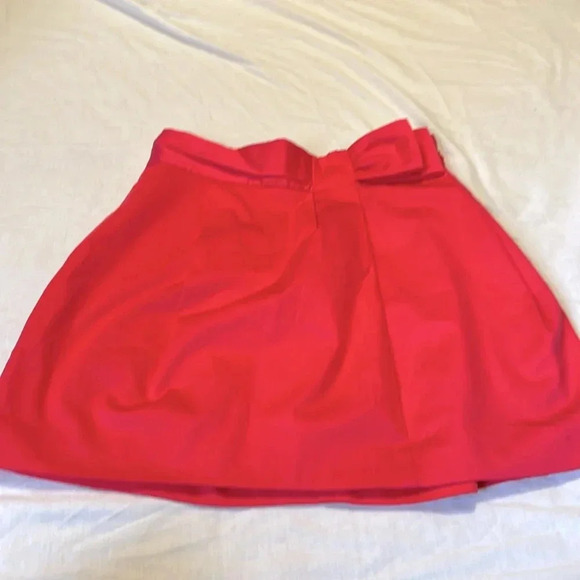 BCBG pink skirt bow detail mini size 10 NWT pockets - Picture 1 of 5